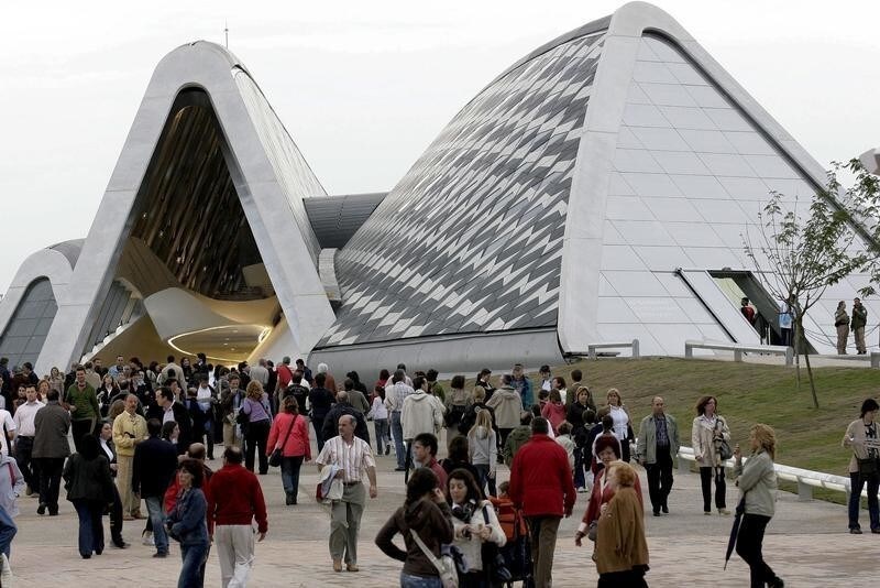 Visitors walk on Bridge Pavilion on Ebro river during a preview of Expo Zaragoza June 11, 2008.