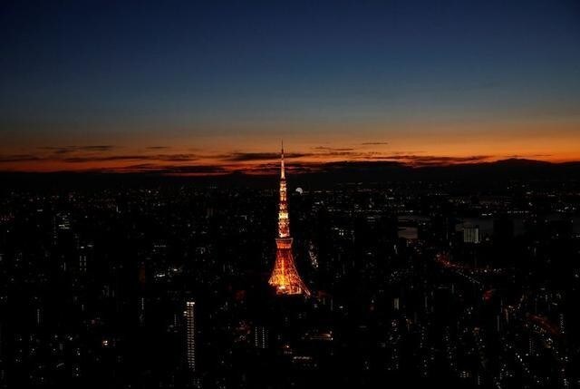 2月20日、国際通貨基金(IMF)によれば、2019年の世界経済は2.9%成長(推定値)にとどまった。写真は東京の日の出。2017年1月撮影