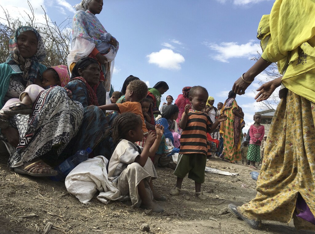 Malnourished children wait for medical attention at the Halo health post in Halo village, a drought-stricken area in Oromia region in Ethiopia, January 31, 2016. Picture taken January 31, 2016. REUTERS/Edmund Blair - RTX24V3D