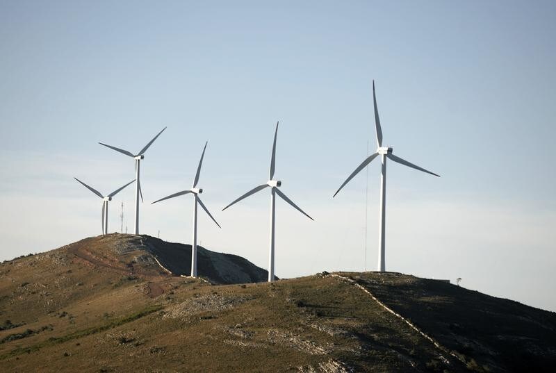 Wind mills are seen on an eolic farm in the "Sierra de Caracoles" place in Maldonado, 170 km (106 miles) east of Montevideo, June 23, 2010. Uruguayan national electric company UTE proceeded on Wednesday with the inauguration of the eolic farm. Uruguayan authorities are aiming to increase the eolic generation from 20 megawatt to 500 in five years.