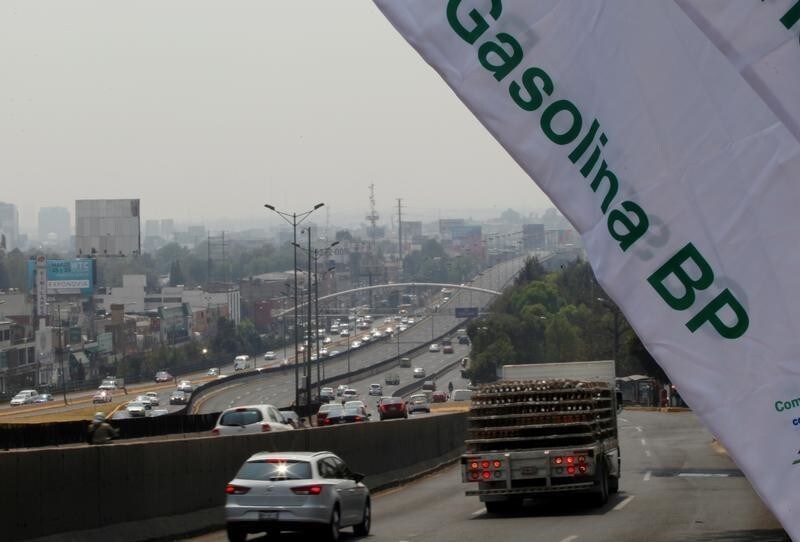 A flag with the BP logo is seen at the new BP petrol station on the outskirts of Mexico City, Mexico March 9, 2017. Flag reads "Gasoline" REUTERS/Carlos Jasso - RC1E70D35E10