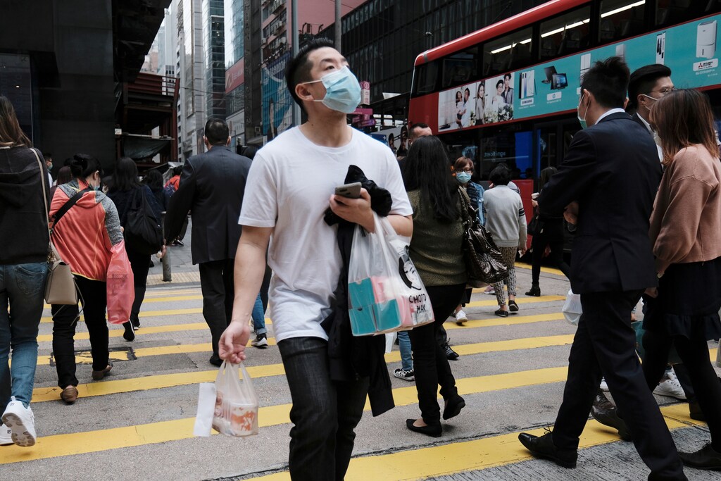 People wear protective face masks as they take their lunch breaks at the financial Central district, following the outbreak of the new coronavirus, in Hong Kong women business businesswoman businessman corporation corporate finance wall street stock exchange capitalism private ownership board c-suite CEOs CFOs corporation united states us america wall street change gender parity equality goldman sachs davos industry representation fair finance fiscal financial economics economies trading trade price money profit value men male female change changing 2020 future taxation tax wealth gross domestic product gdp Coronavirus china virus health healthcare who world health organization disease deaths pandemic epidemic worries concerns Health virus contagious contagion viruses diseases disease lab laboratory doctor health dr nurse medical medicine drugs vaccines vaccinations inoculations technology testing test medicinal biotechnology biotech biology chemistry physics microscope research influenza flu cold common cold bug risk symptomes respiratory china iran italy europe asia america south america north washing hands wash hands coughs sneezes spread spreading precaution precautions health warning covid 19 cov SARS 2019ncov wuhan sarscow wuhan pneumonia pneumonia outbreak patients unhealthy fatality mortality elderly old elder age serious death deathly deadly