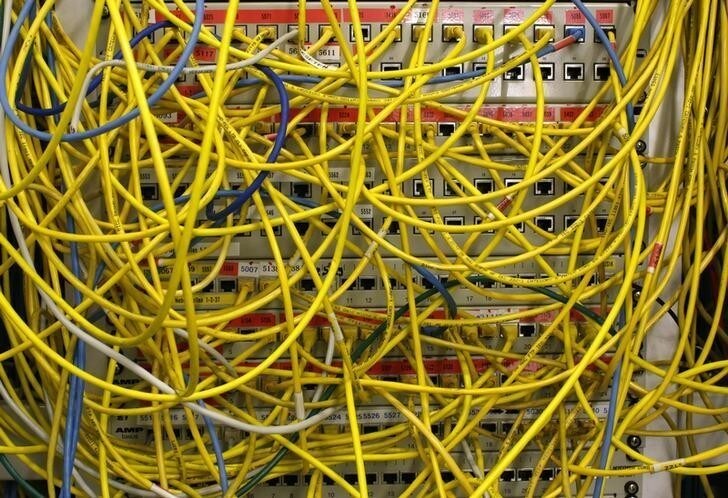 Ethernet cables used for internet connections are pictured in a Berlin office, August 20, 2014. The German cabinet discussed on Wednesday Germany's digital agenda for the future. REUTERS/Fabrizio Bensch (GERMANY - Tags: POLITICS)