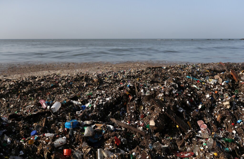 Plastic and other debris are seen on the shores of Montesinos beach, in Santo Domingo, Dominican Republic July 19, 2018. REUTERS/Ricardo Rojas - RC1D7B8E3740