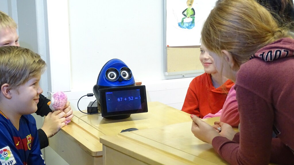 Students use a mathematics teaching robot Ovobot during their lesson at the school in Tampere, Finland March 27, 2017. REUTERS/Attila Cser - RC1639E025C0