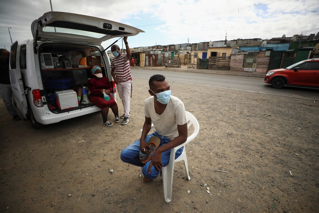 A man waits to be tested for tuberculosis at a mobile clinic in Gugulethu township near Cape Town, South Africa.