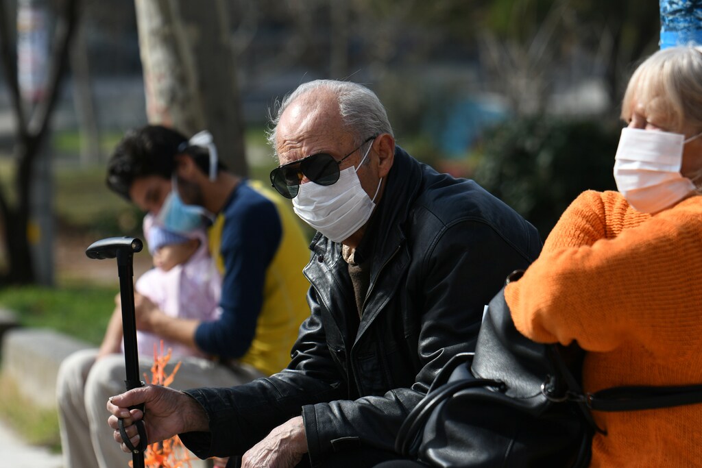 People wearing protective face masks sit outside the AHEPA hospital, where the first confirmed coronavirusCoronavirus china virus health healthcare who world health organization disease deaths pandemic epidemic worries concerns Health virus contagious contagion viruses diseases disease lab laboratory doctor health dr nurse medical medicine drugs vaccines vaccinations inoculations technology testing test medicinal biotechnology biotech biology chemistry physics microscope research influenza flu cold common cold bug risk symptomes respiratory china iran italy europe asia america south america north washing hands wash hands coughs sneezes spread spreading precaution precautions health warning covid 19 cov SARS 2019ncov wuhan sarscow wuhanpneumonia pneumonia outbreak patients unhealthy fatality mortality elderly old elder age serious death deathly deadly