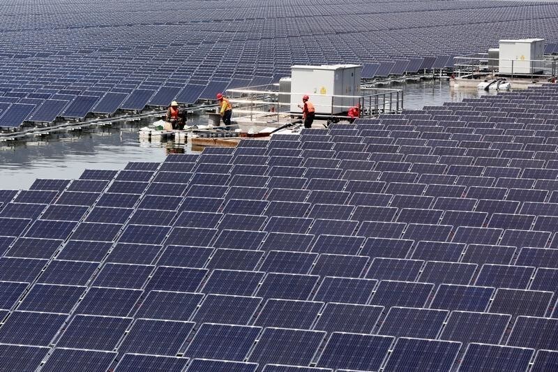 Solar panels are seen at a floating solar plant in Huaibei, Anhui province, China April 24, 2018.