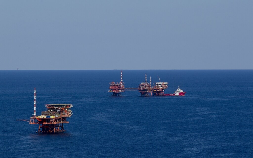 An oil platform is seen in the Adriatic Sea, Croatia, May 28, 2015. When Croatia announced in 2013 it would set a tender to explore for oil and gas in its pristine Adriatic waters, the government evoked the hydrocarbon riches of Norway to win over the plan's many detractors. Prime Minister Zoran Milanovic in April, defended an effort he hopes could help turn around Croatia's economic fortunes after six years of recession. He was responding to public concerns that the project is a high-risk gamble that may forever change the way of life on Croatia's more than 1,000 islands, hurt its lucrative tourism industry and harm the environment. But with contracts expected to be signed with five selected concessionaires by July, opposition from local and international environmentalists, politicians and even pop stars -- expressed in the campaign "SOS for Adriatic" -- is only growing. Picture taken May 28, 2015. REUTERS/Antonio Bronic - GF10000113867