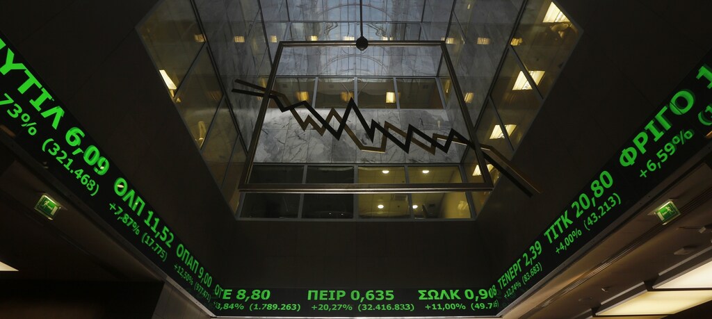 A stock ticker shows stock options making major gains, inside the Athens stock exchange building February 3, 2015.