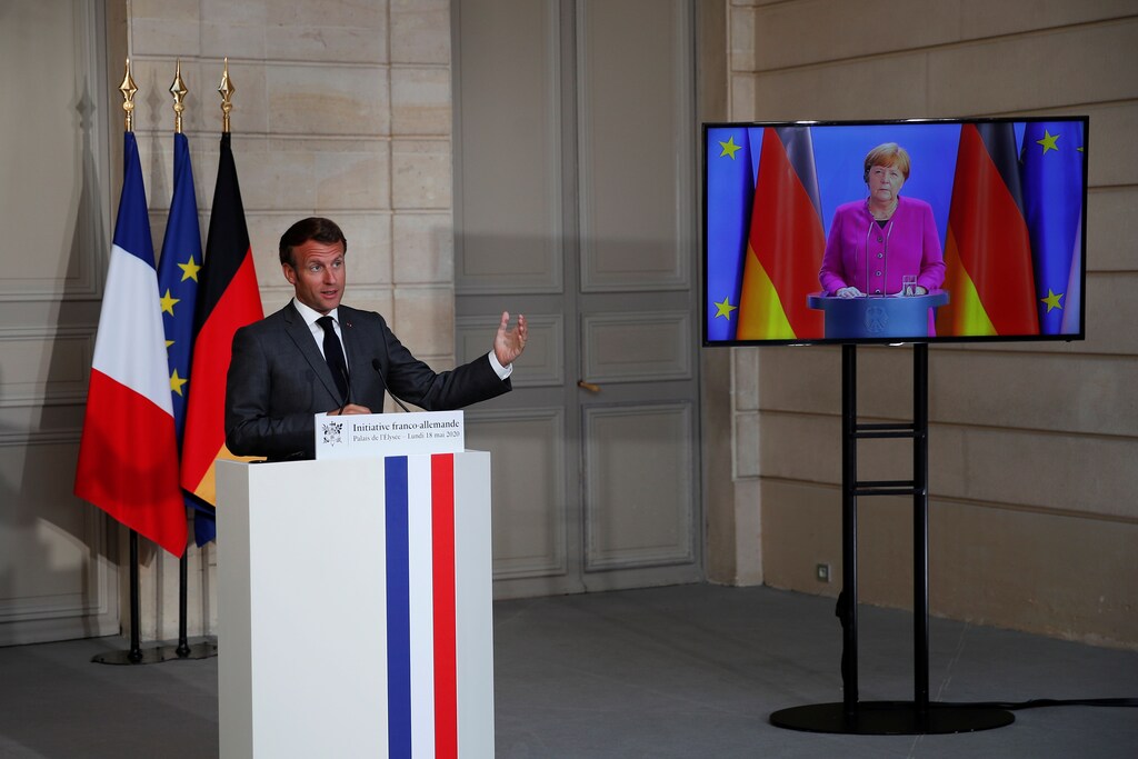 French President Emmanuel Macron speaks at a joint video news conference with German Chancellor Angela Merkel to discuss Europe's economic recovery plans to respond to the coronavirus crisis at Elysee Palace in Paris, France May 18, 2020. Francois Mori/Pool via REUTERS - RC23RG9E9TE9