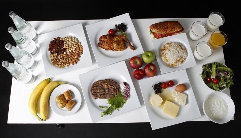 The daily meal intake of Turkish javelin thrower and Olympic hopeful Fatih Avan, 23, is pictured in Ankara May 29, 2012. Avan made the world's second best throw of 2012 but the Olympic Games have a special place in his heart. "I may have become an elite athlete with my good performances but I can only be a great athlete if I can win an Olympic medal," he says. Avan complements his rigorous training schedule with a nutritional programme which gives him a daily intake of 3500 kcal. His diet is mainly protein-based. "A good diet is essential for power. A correct and consistent diet proves its value in my training," he says. Picture taken May 29, 2012.
