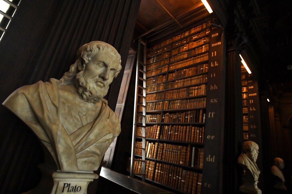 A bust of Plato is seen in the Long Room of the old library that houses 200,000 of Trinity College's oldest books in Dublin, Ireland, September 14, 2018. REUTERS/Clodagh Kilcoyne - RC16936CDB40