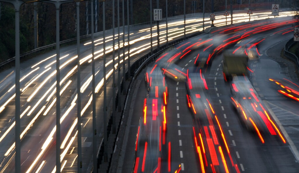 Car light trails are pictured as traffic drives along a highway during a nationwide railway strike in Berlin November 15, 2007. German train drivers escalated a 62-hour strike early on Thursday, adding disruption to passenger services to a freight stoppage in a long-running dispute with rail operator Deutsche Bahn.