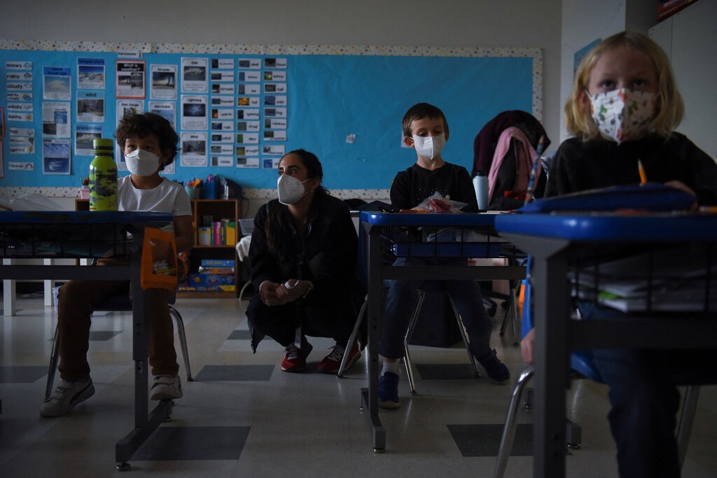 Marisela Maddox, a parent of students Atlas and Hero Smookler, works as a substitute teacher at the Austin Jewish Academy as the spread of the Omicron variant leads to teacher shortages amid the coronavirus disease (COVID-19) pandemic in Austin, Texas, U.S., January 20, 2022. REUTERS/Callaghan O'Hare