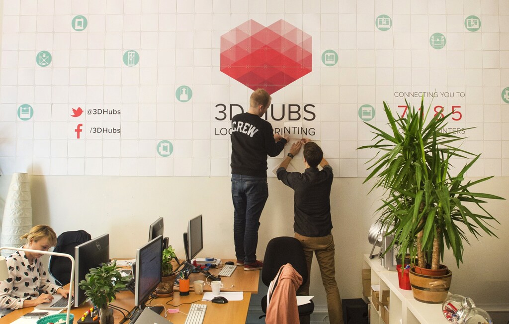 Workers are seen at the 3D Hubs office in Amsterdam September 2, 2014. In a continent where one in five young people are out of work, governments are pumping more and more cash into startups in the hope they can goose economic growth. Exact numbers are hard to determine, but according to AngelList, a website for new companies, there are now more than 4,700 startups in Europe, compared with nearly 14,000 in the United States. Picture taken September 2, 2014. To match Insight EUROPE-STARTUPS/MAKERS REUTERS/Toussaint Kluiters/United Photos (NETHERLANDS - Tags: BUSINESS SCIENCE TECHNOLOGY) - RTR4690X