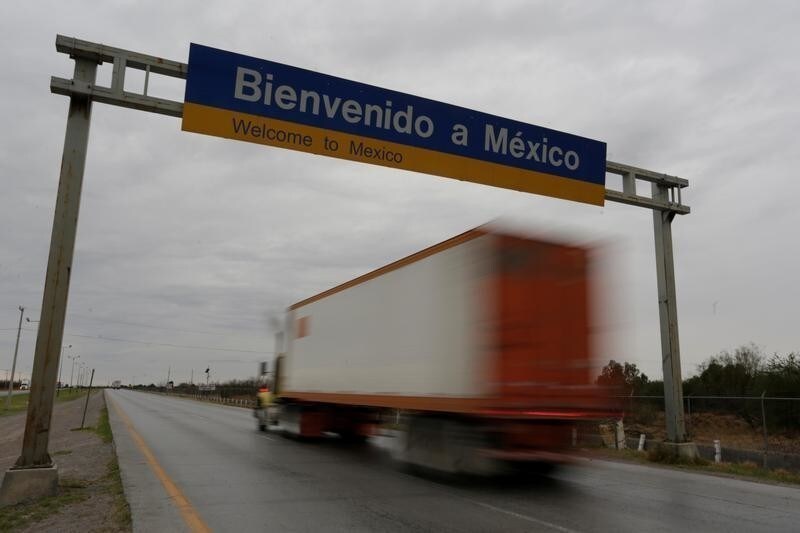 A truck passes near border customs at the World Trade Bridge in Nuevo Laredo, Mexico, January 28, 2017. REUTERS/Daniel Becerril - RTSXUBZ