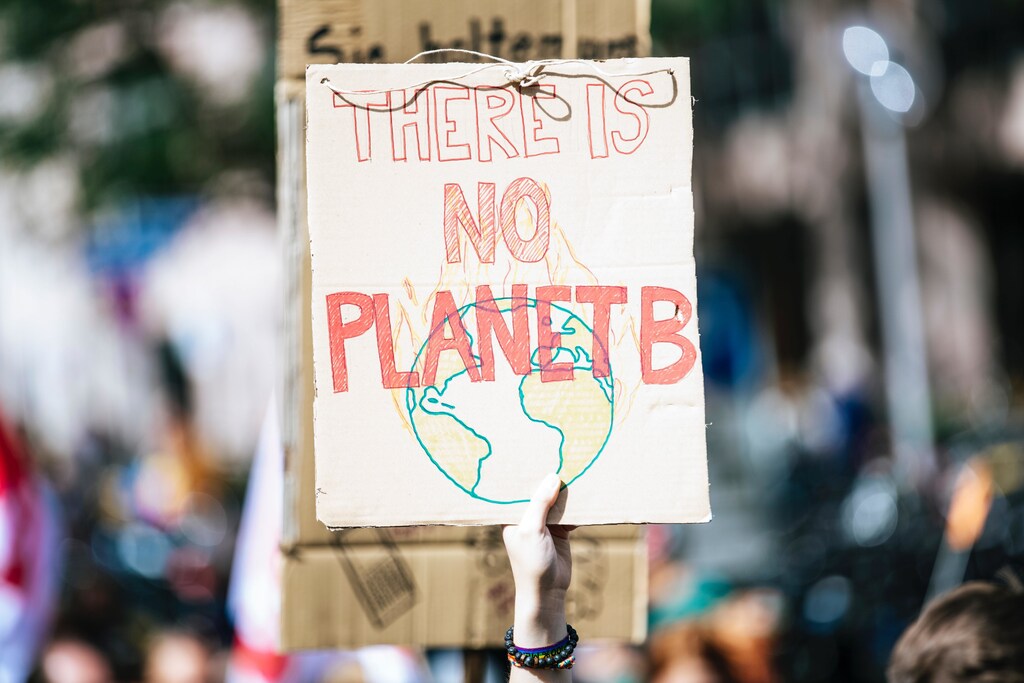 Governments must take more action to address climate change and help people live sustainably, such as providing better public transport and "active travel" infrastructure.