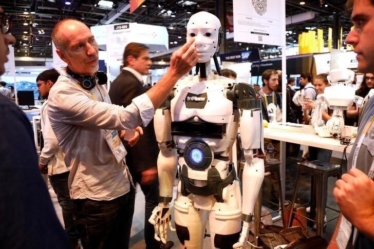 French Sculptor Gael Langevin shows his InMoov robot, a life-size robot made of cheap circuit-boards and plastic parts that anyone can download at home and make on a 3-D printer, at the Viva Tech start-up and technology summit in Paris, France, May 25, 2018. REUTERS/Charles Platiau