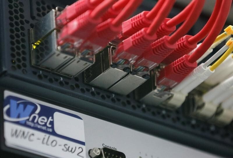 Ethernet cables used for internet connection are seen next to the company's logo at the headquarters of the Wnet internet service provider in Kiev, Ukraine July 26, 2017.