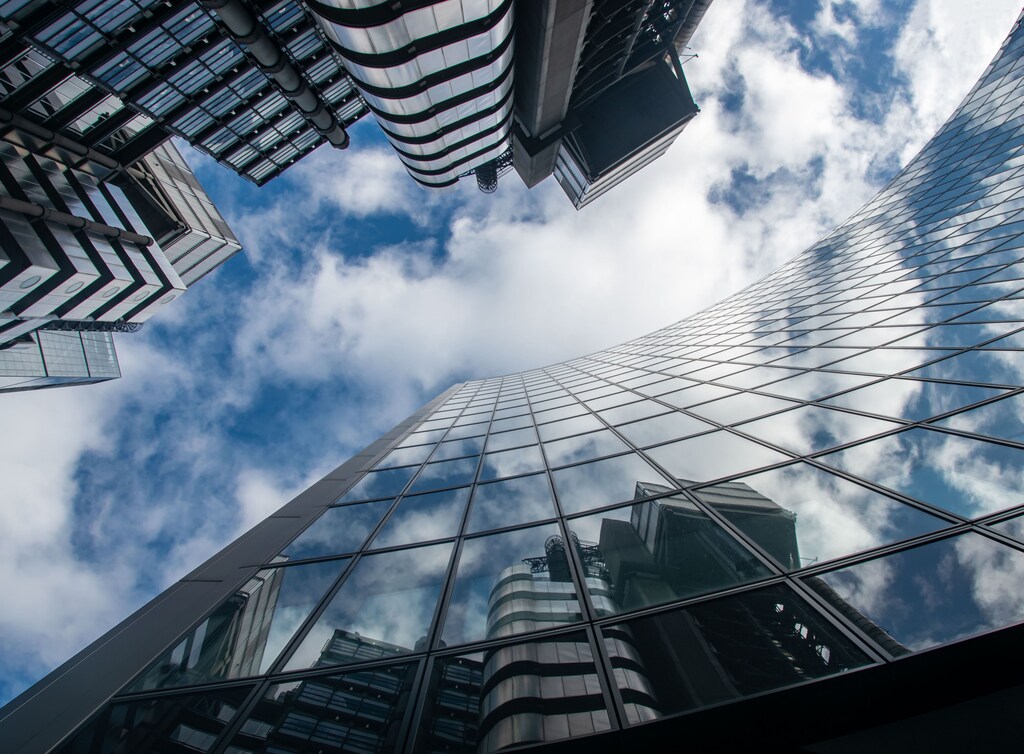 looking up at buildings in the city of london in a story about central banks and payments