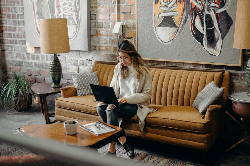 The surge in working from home, like this woman here, means that leaders need to hold a “working from home” relaunch to help their teams learn to reorient based on the new realities.