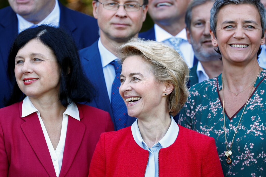EU Commission President-designate Ursula Von der Leyen, EU Commission Vice President-designate Vera Jourova and EU Commission Executive Vice President-designate for the Digital Age Margrethe Vestager react as they pose for a photo during a seminar of the new European Commission designated executives at the Chateau du Lac hotel in Genval, Belgium, September 12, 2019. REUTERS/Francois Lenoir - RC1282E34AD0