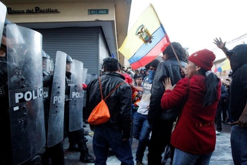 Supporters of Ecuador's former President Rafael Correa clash with police during a protest after an Ecuadorean judge ordered Correa to be jailed as part of a case involving the kidnapping of a lawmaker, in Quito, Ecuador July 5, 2018.