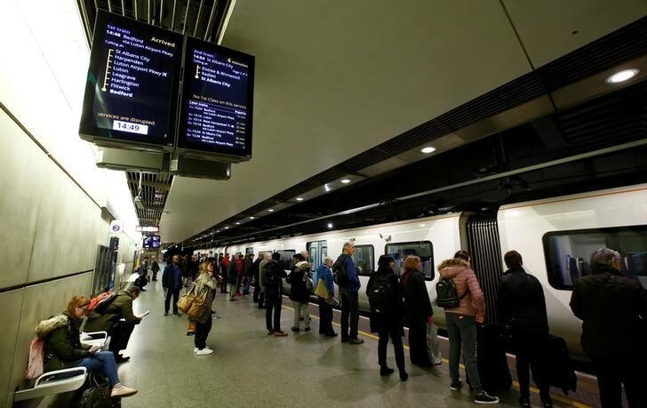 Passengers wait to board a train at St Pancras International railway station, London, Britain, January 26, 2018. REUTERS/Peter Cziborra