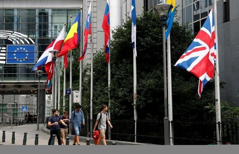 A Union Jack flag is lowered at half-mast in honor of the victims of the Manchester attack, outside the European Parliament in Brussels, Belgium May 23, 2017. REUTERS/Francois Lenoir - RC1B9BF51AF0