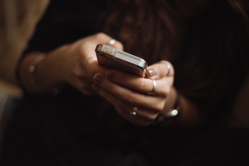 some women, like this woman using her phone here, have turned to Instagram for mental health support