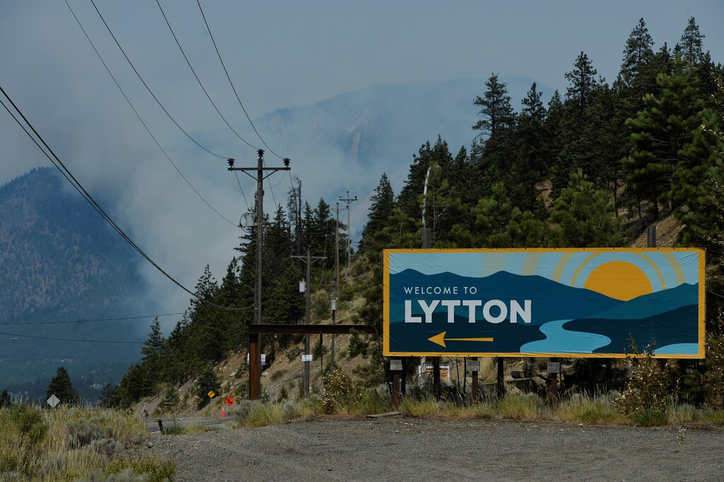 The sign for the town of Lytton, where a wildfire raged through and forced residents to evacuate, is seen in Lytton, British Columbia, Canada July 1, 2021. REUTERS/Jennifer Gauthier - RC2PBO9GJ2NE