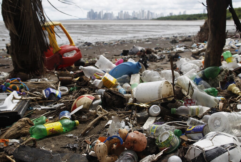 Discarded toys are seen amongst trash, on a beach near the high-income Costa del Este neighbourhood in Panama City September 10, 2013. The National Association for the Conservation of Nature (ANCON) reports that the majority of Panama City's beaches and rivers are contaminated with plastic and general waste due to lack of awareness for waste management, causing major problems for fishermen and negative impact on mangroves and their wildlife. Picture taken September 10, 2013. REUTERS/Carlos Jasso (PANAMA - Tags: ENVIRONMENT SOCIETY) - GM1E99I1RD801