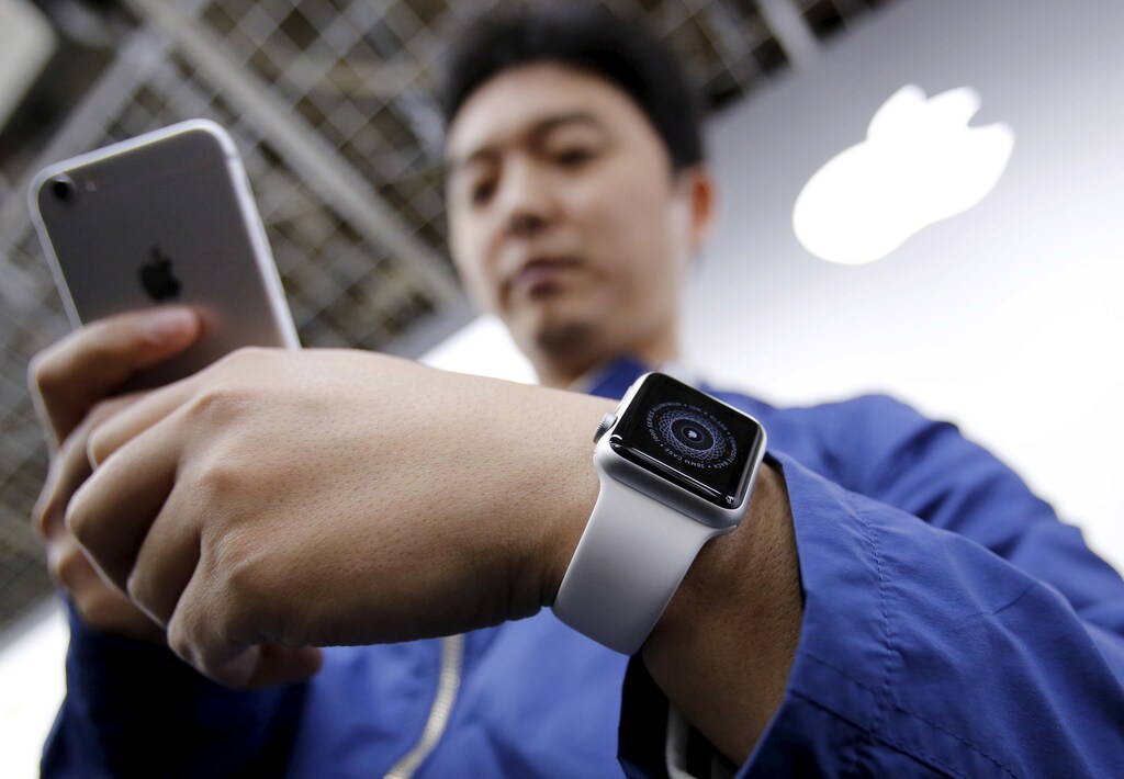 Tomoyoshi Fujimura sets up his Apple Watch in Tokyo, 2015.