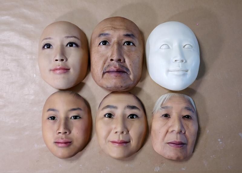 Super-realistic face masks are displayed at factory of REAL-f Co. in Otsu, western Japan, November 15, 2018. REUTERS/Kwiyeon Ha - RC17812FE5E0