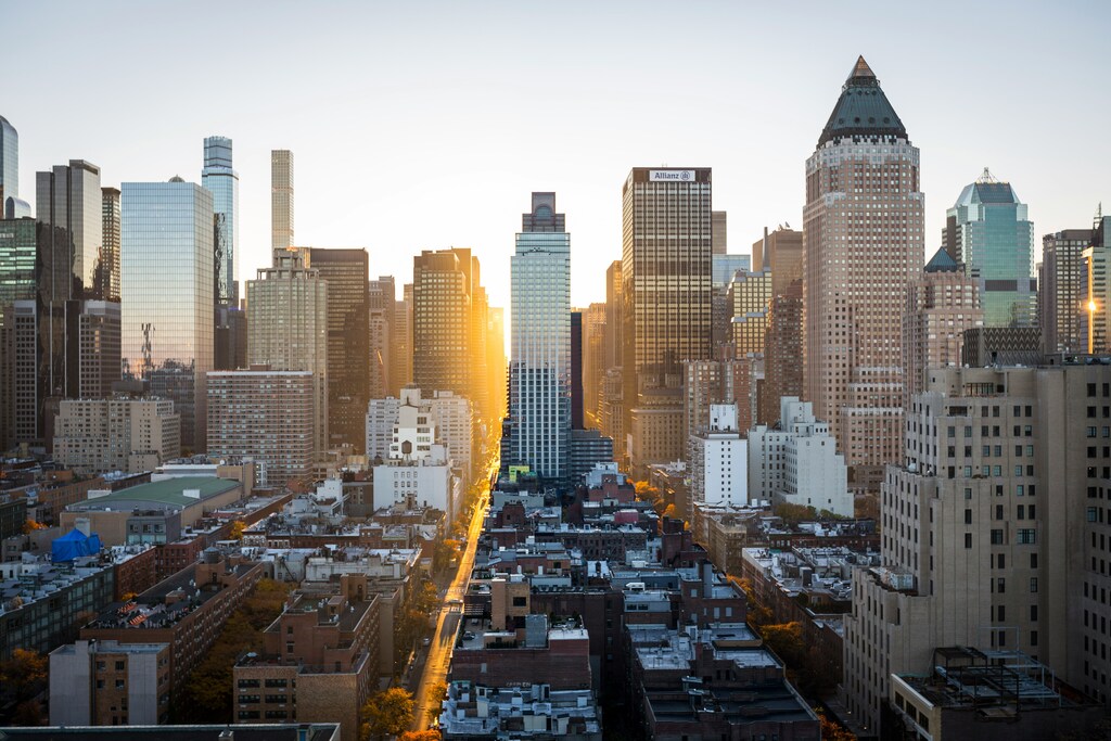 Sunrise peaking through the New York city skyline.