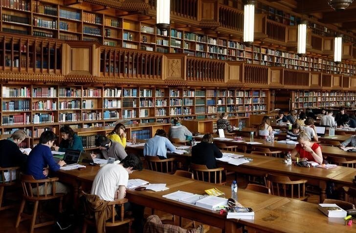 Students sit in the library of the university KU Leuven "Katholieke Universiteit Leuven" in Leuven, Belgium, June 8, 2016. REUTERS/Francois Lenoir