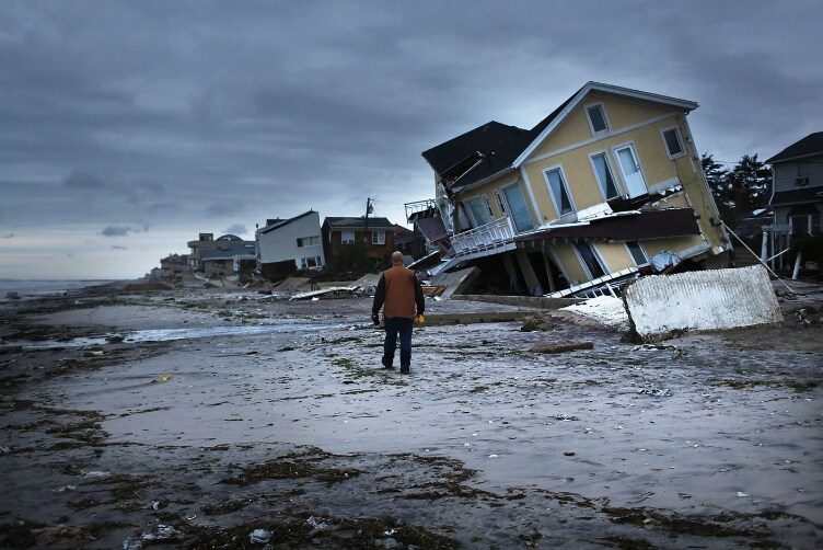 Houses collapsed beach natural disasters economic development middle-class incomes