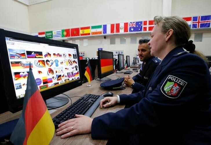 Law enforcement officers from Germany take part in the opening of the International Police Cooperation Centre ahead of the 2018 FIFA World Cup in Domodedovo near Moscow, Russia June 12, 2018. REUTERS/Sergei Karpukhin