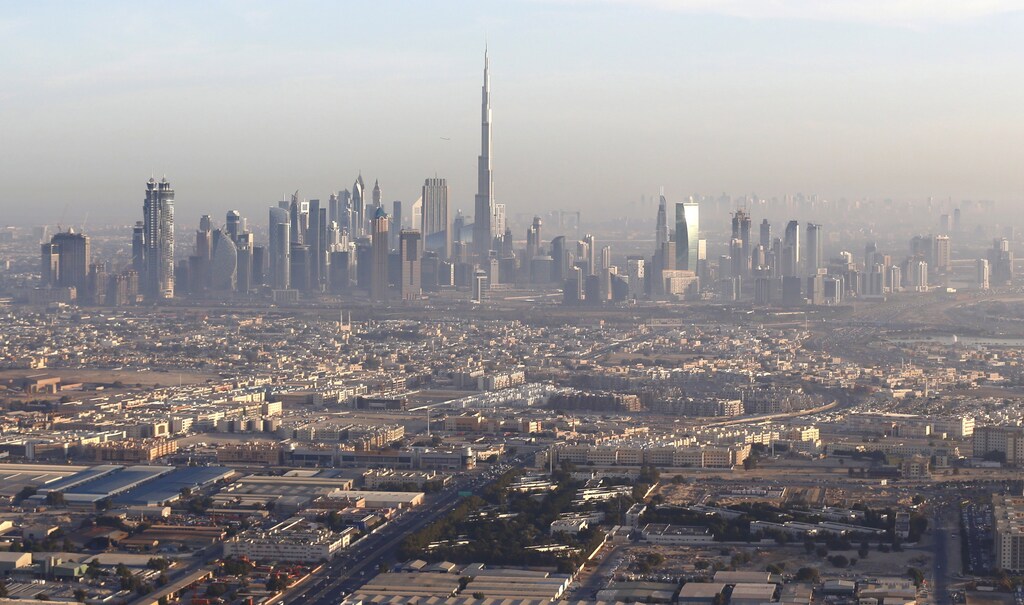 A general view of Dubai and the world's tallest tower, the Burj Khalifa (C), December 9, 2015. Photo taken December 9, 2015. REUTERS/Karim Sahib/Pool - GF10000261120