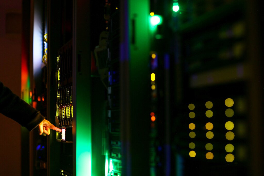 A man poses inside a server room at an IT company in this June 19, 2017 illustration photo. REUTERS/Athit Perawongmetha/Illustration - RC159C4FB990