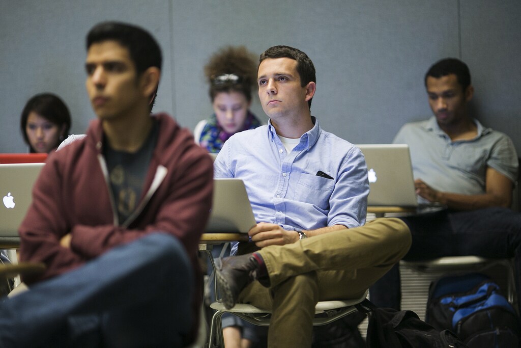 Students at Stanford University listen during a presentation.