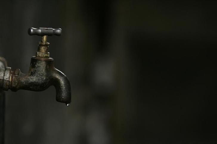 A water tap is seen in an old district in Shanghai March 20, 2008. Well aware of its shoddy environmental image, China has declared cleaner water as one of its major policy goals and it has thrown open the doors to foreign firms eager to grab a piece of the fast-growing $14.2 billion market. Picture taken March 20, 2008. To match feature CHINA-WATER/ REUTERS/Aly Song (CHINA)