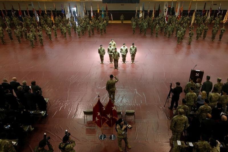 General Michael A. Bills (front C), incoming Commanding General, Eighth Army Chief of Staff, ROK-US Combined Forces Command, salutes during a change of command ceremony at the Collier Fitness Center on Camp Humphreys in Pyongtaek, South Korea. 05 January 2018. REUTERS/Jeon Heon-kyun/Pool - RC1319D57C00