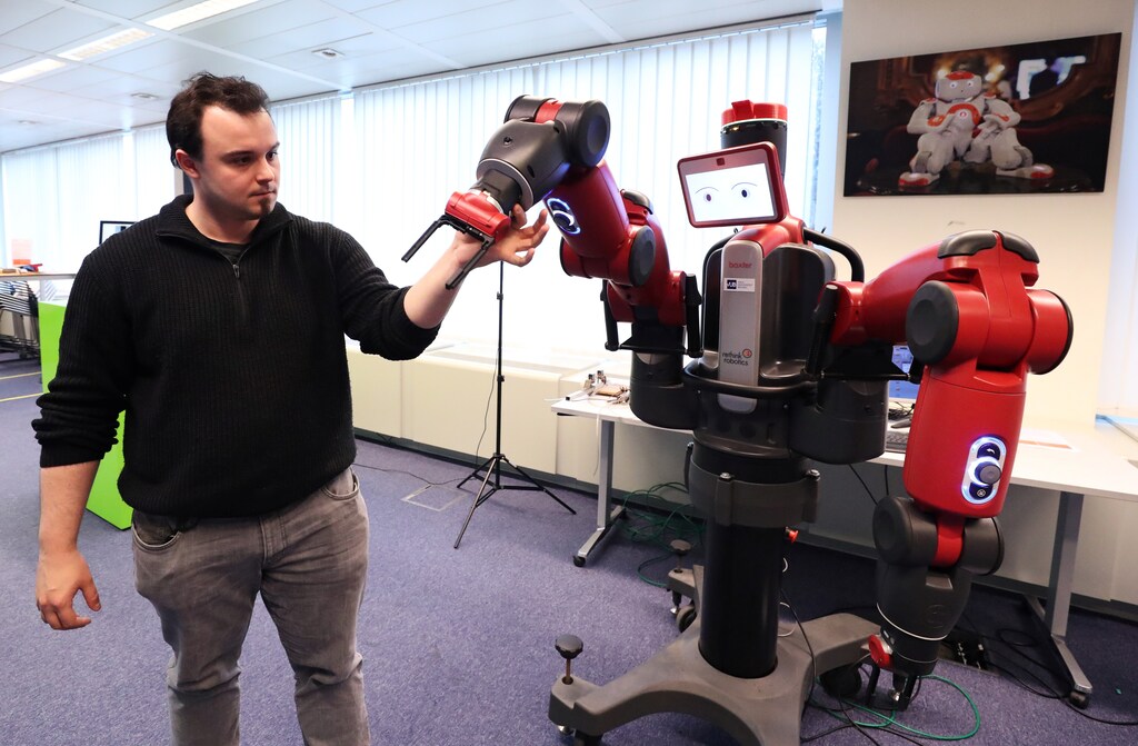 Youri Coppens, researcher at the VUB AI Lab presents a robot equipped with an artificial intelligence device at the AI Xperience Center at the VUB (Vrije Universiteit Brussel) in Brussels, Belgium February 19, 2020. REUTERS/Yves Herman - RC2R3F97UZPT