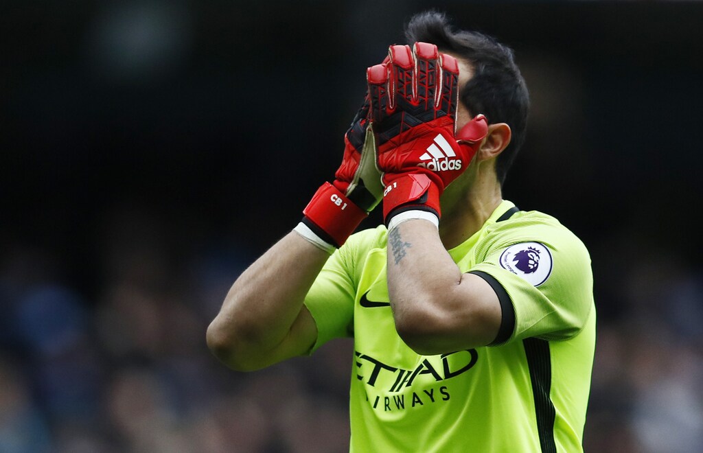 Britain Football Soccer - Manchester City v Chelsea - Premier League - Etihad Stadium - 3/12/16 Manchester City's Claudio Bravo looks dejected Action Images via Reuters / Jason Cairnduff Livepic EDITORIAL USE ONLY. No use with unauthorized audio, video, data, fixture lists, club/league logos or "live" services. Online in-match use limited to 45 images, no video emulation. No use in betting, games or single club/league/player publications. Please contact your account representative for further details. - RTSUGNQ