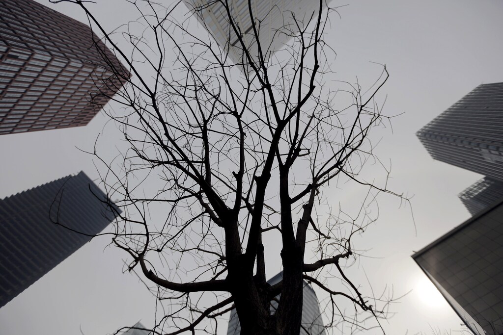 Buildings are seen at the Yujiapu financial centre, in Tianjin, China February 22, 2016. Yujiapu, part of a highly touted financial district in Tianjin's Binhai New Area once billed by leaders as China's answer to Manhattan, has drawn scrutiny from experts as an example of the costly infrastructure splurges that fuelled development across the country at the height of the economic boom. REUTERS/Jason Lee TPX IMAGES OF THE DAY - GF10000318665