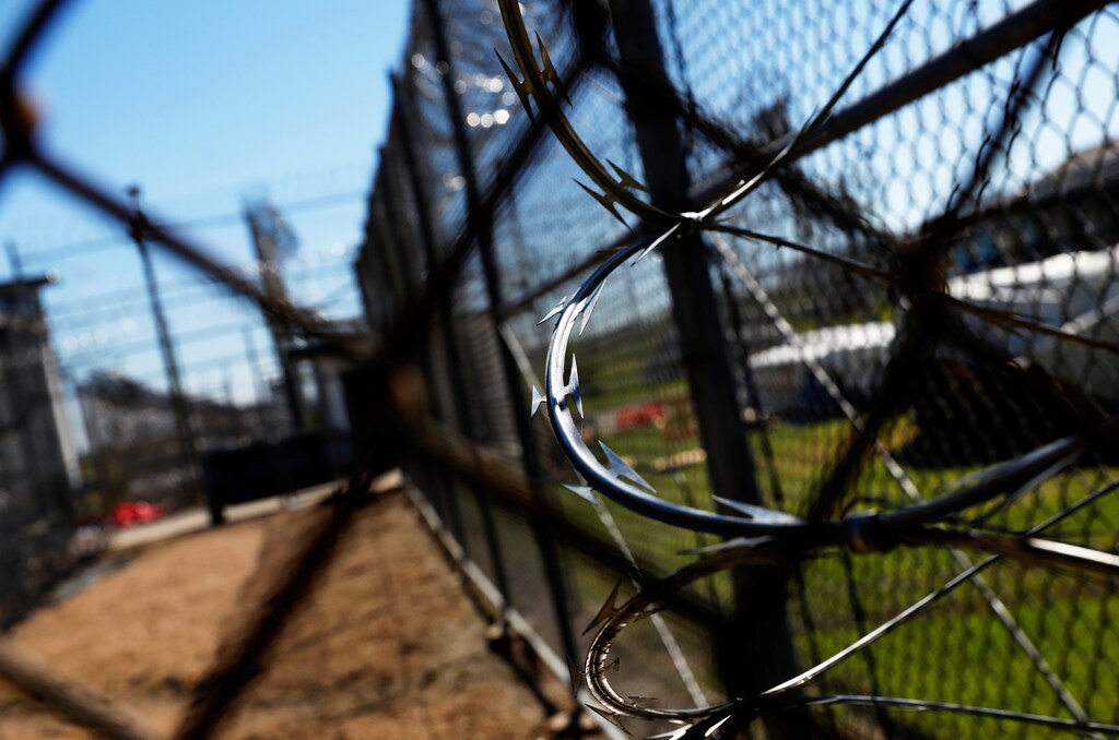 Barbed wire is seen inside the Louisiana State Penitentiary in Angola, Louisiana, March 7, 2018. Picture taken March 7, 2018. To match Special Report USA-JAILS/LOUISIANA REUTERS/Shannon Stapleton - RC1CA5F4DFD0