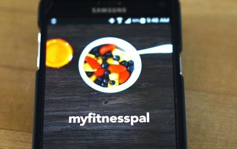 The MyFitnessPal app is seen on a smartphone in Golden, Colorado in this February 5, 2015 photo illustration. Under Armour Inc, which provides sports clothing and accessories, has acquired two mobile apps for about $560 million, moving deeper into the trendy "connected fitness" and wearable devices sphere. The company said it would pay $475 million for MyFitnessPal, a free app for tracking food habits and caloric intake. REUTERS/Rick Wilking (UNITED STATES - Tags: BUSINESS SCIENCE TECHNOLOGY HEALTH) - GM1EB2603ZA01