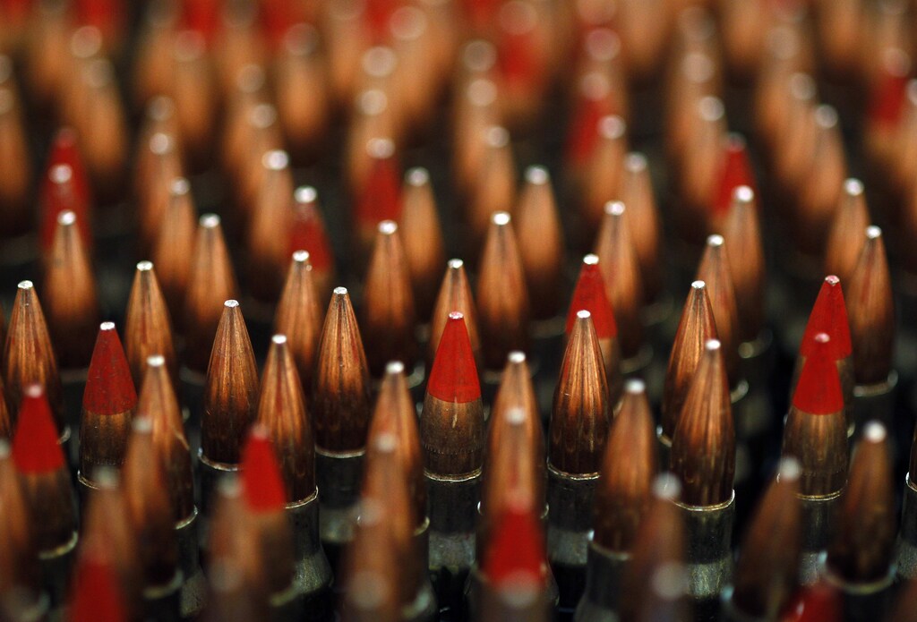 Links of 7.62mm rounds wait to be packaged after coming off the production line at the BAE Systems Global Combat Systems Munitions Limited plant in Crewe, central England, June 8, 2011. REUTERS/Phil Noble (BRITAIN - Tags: BUSINESS MILITARY) - LM1E7680Z8F01